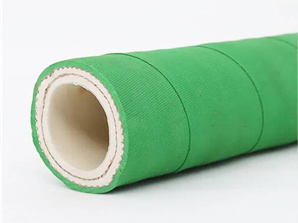 A smooth wound green chemical hose.