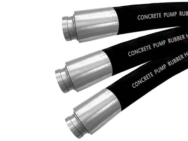 Three concrete pump rubber hoses on white background.