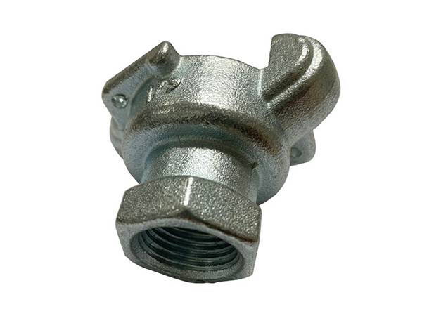 A silver gray female thread Chicago type coupling