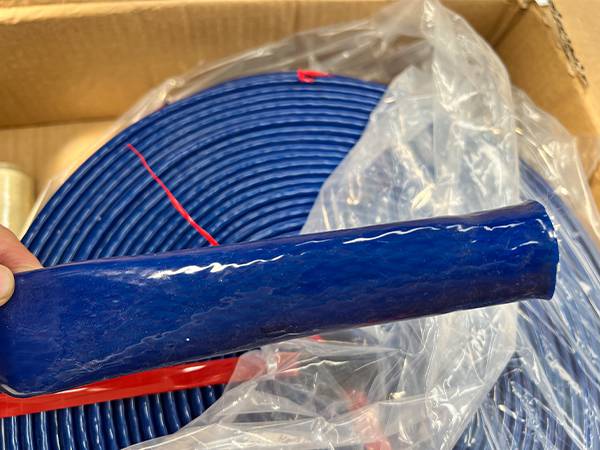 A roll of blue hose sleeve of high temperature resistant flexible metal hose