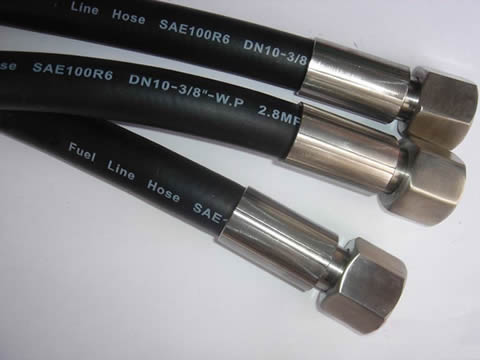 Three pieces of SAE 100R6 hydraulic hoses with fittings.