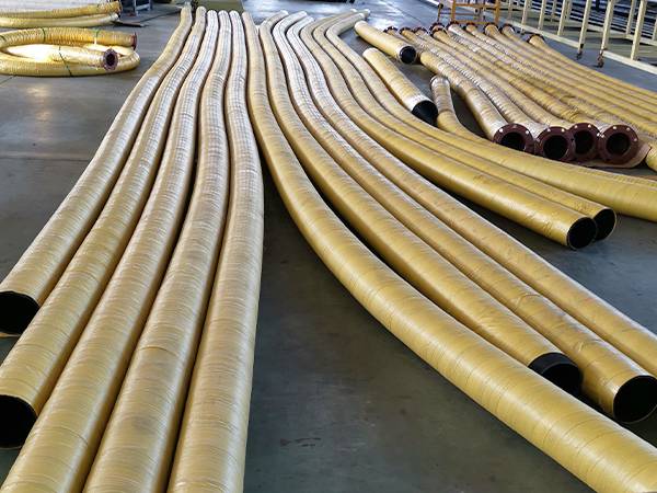 Suction & discharge hoses in factory waiting to be fitted with joints